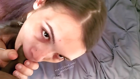 Busty black girl sucks the big black cock from behind