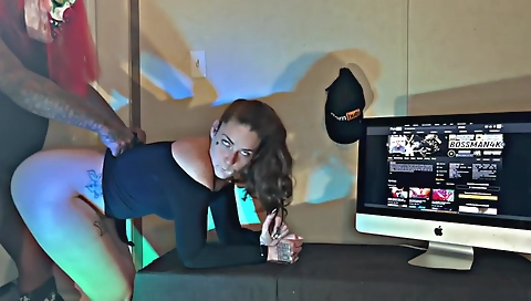 Busty black hottie with a big booty is making a video