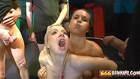 Two friends share a dildo while a third fucks them in a hairy mouth