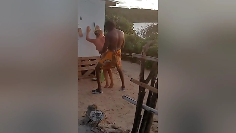 A couple of horny women fucks with an african tribe man