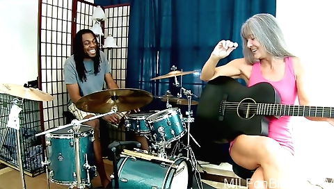 Mature woman is in the black camp by her boyfriend