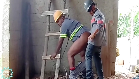 Gay black man and brunette girl are having outdoor sex