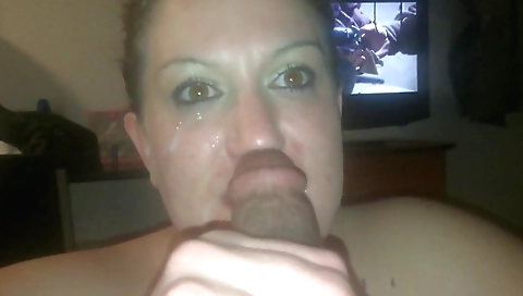 Brunette milf with tattooed lips gives cum in mouth and face