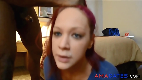 Busty red-haired ebony lady takes a hot facial on webcam