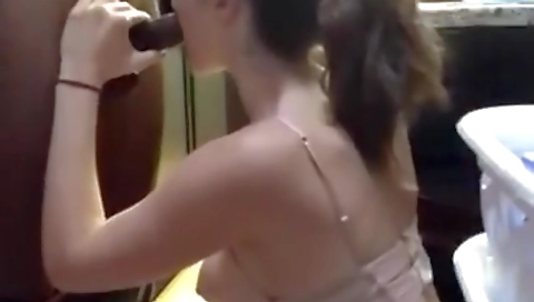 A teen with big tits and a big dick is in the kitchen