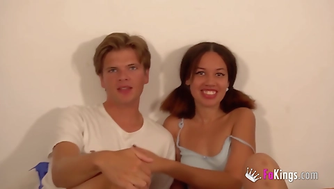 Brunette teen gives a deep throat blowjob to a black dude