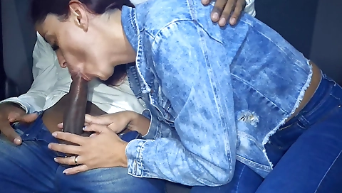 Brazilian girl in the car is giving blowjob to the driver